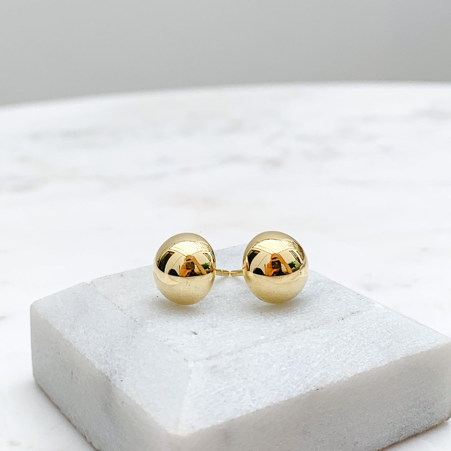 Aretes media bola Oro18k