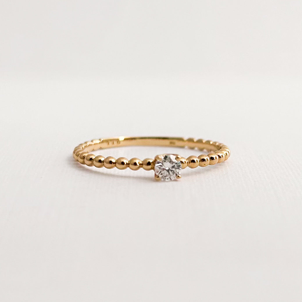 Anillo Ribe con diamante 0.11 cts en oro 18k