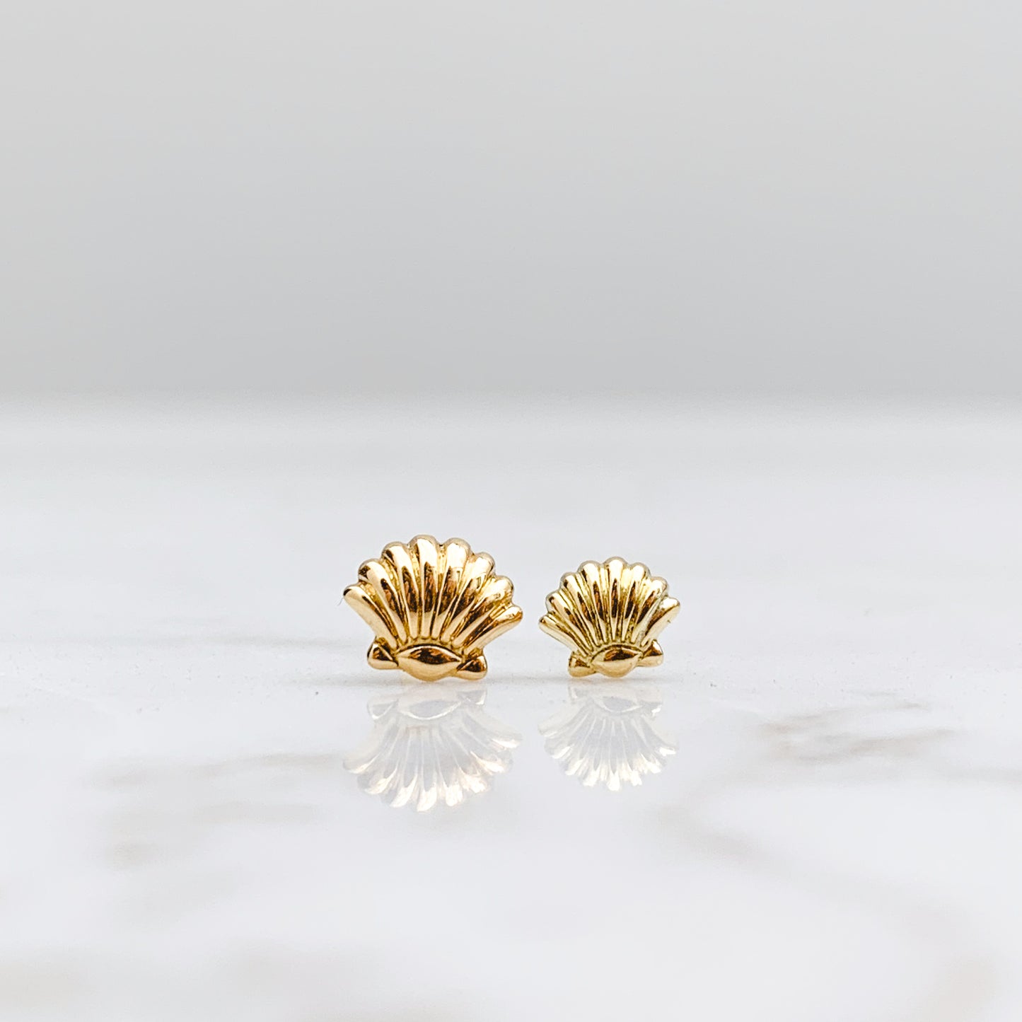 Aretes de bebé Oro18k conchita de mar