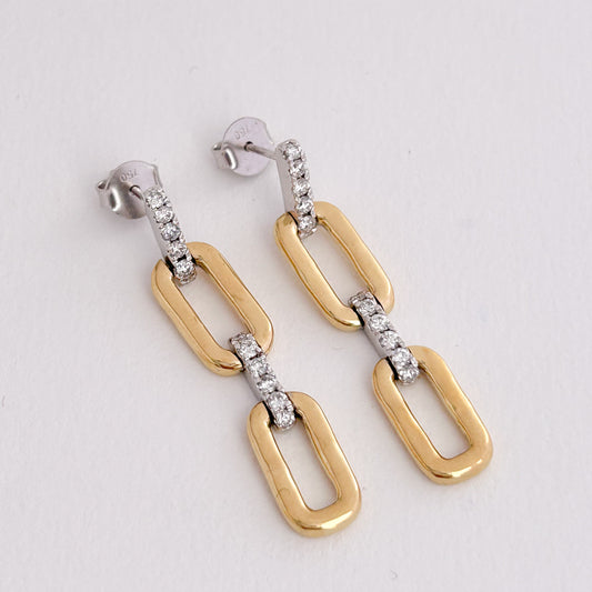 Aretes clip colgantes con oro blanco y diamantes en Oro 18k