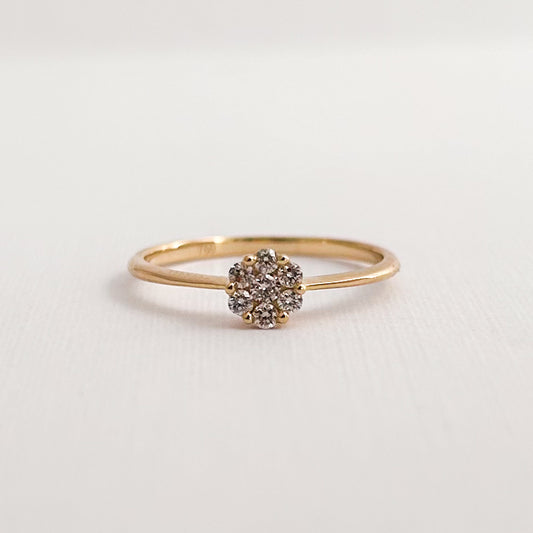 Anillo mini roseta redonda con diamantes 0.14 cts en oro 18k