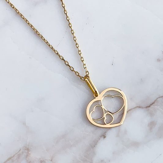 Dije corazones unidos de Oro18k