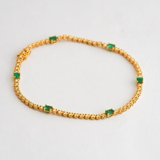 Tenis Lyra con esmeraldas y diamantes naturales en oro 18k