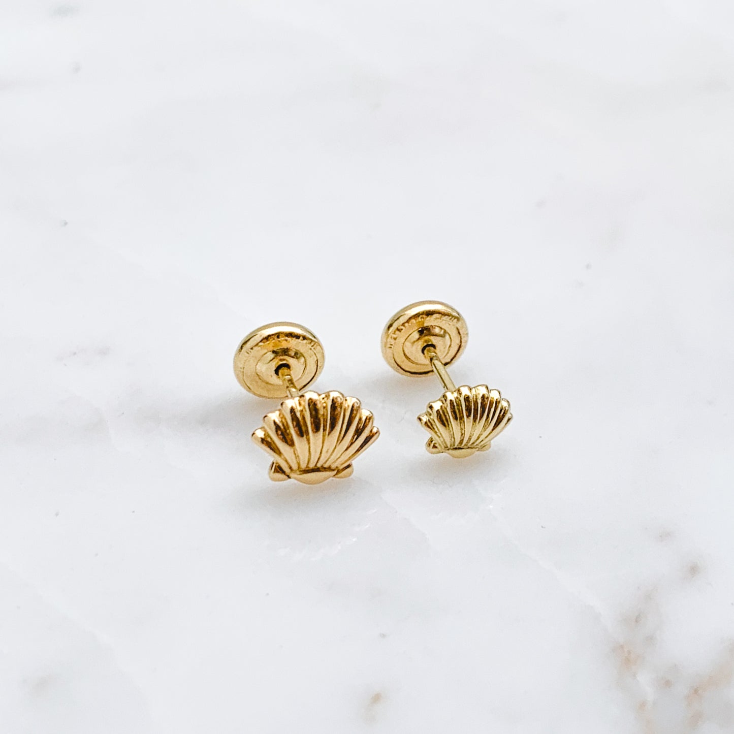 Aretes de bebé Oro18k conchita de mar