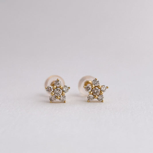 Aretes rosetas mini con diamantes en Oro 18k