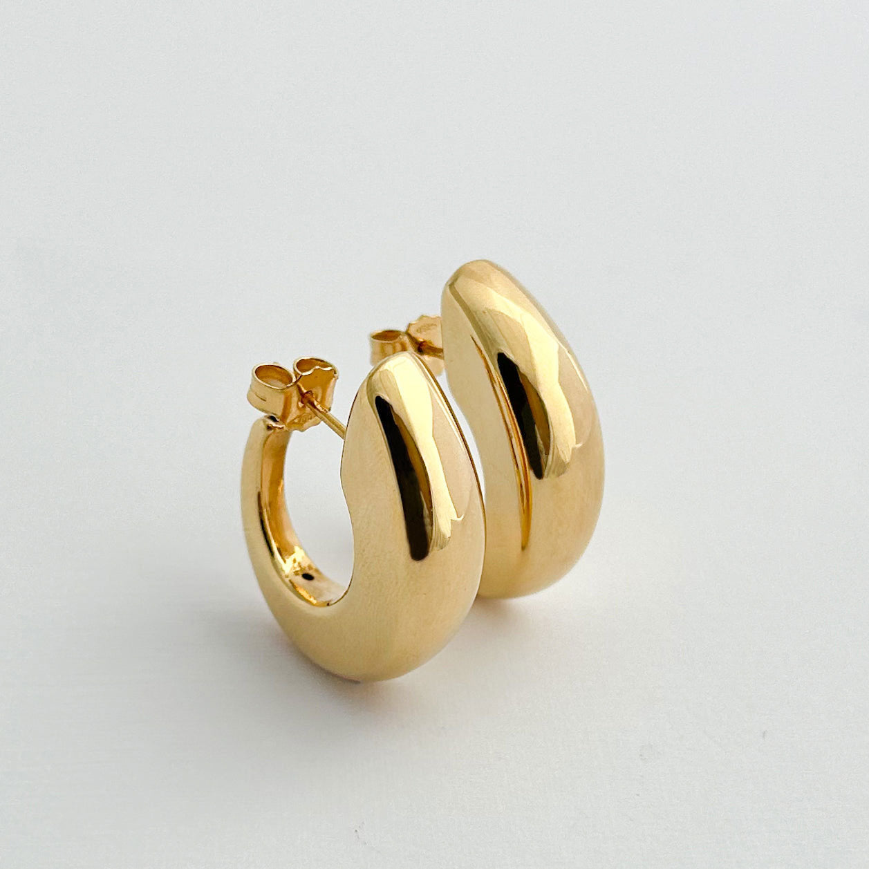 Aretes curva oro 18k