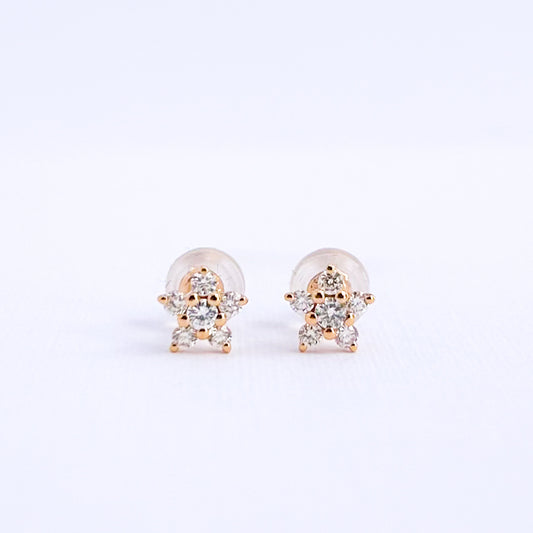 Aretes rosetas mini con diamantes en Oro 18k