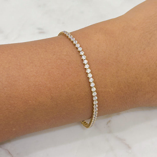 Pulsera tenis delgada circones oro 18k