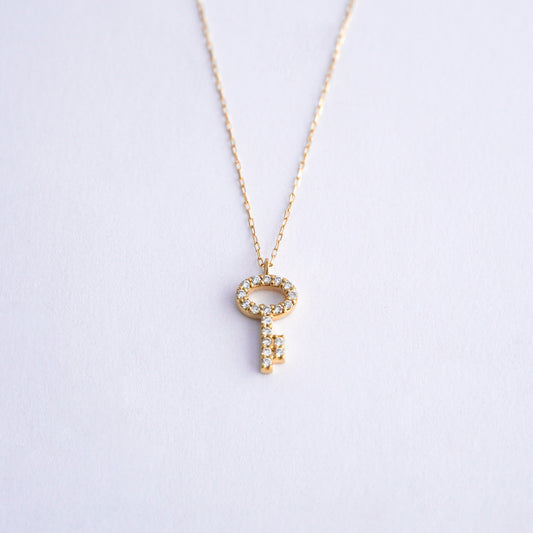 Collar llave con diamantes naturales en Oro18k