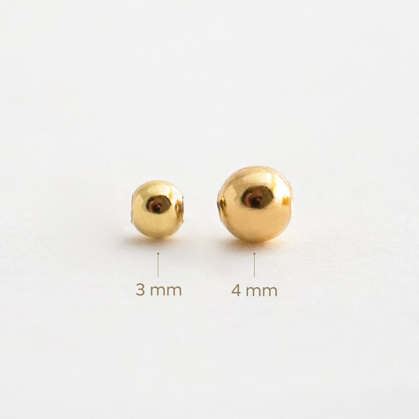 Bolita Pasante Lisa en Oro 18K