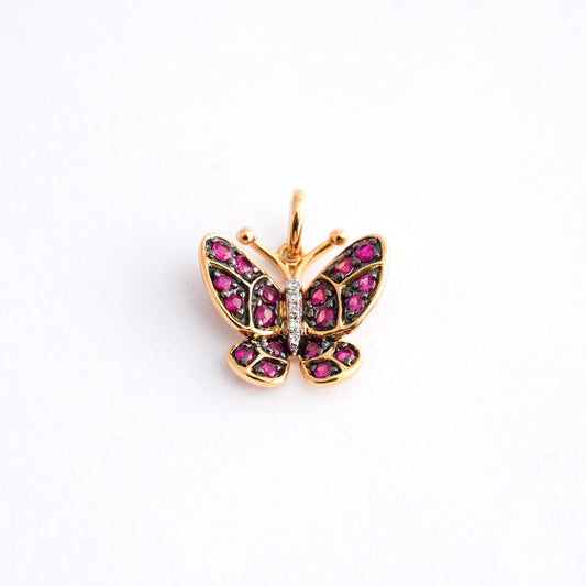 Dije mariposa rubí con diamantes naturales en oro18k