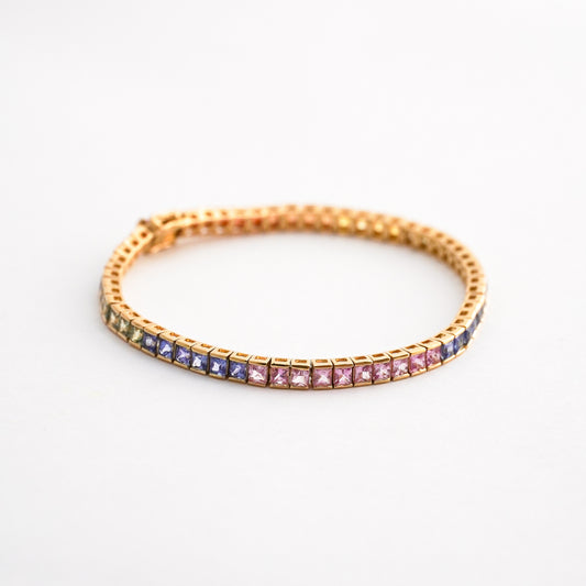 Pulsera Tennis Rainbow con Zafiros Naturales Corte Princesa en Oro 18K