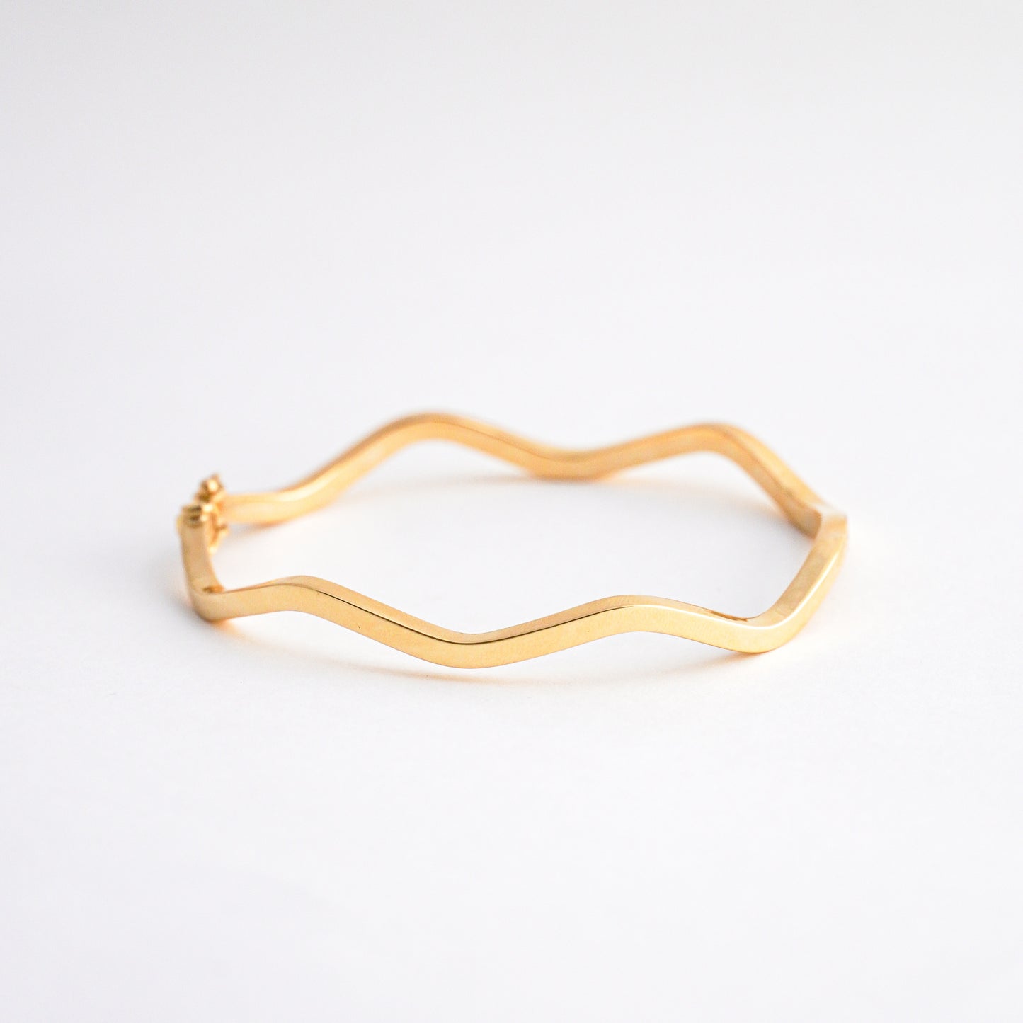 Puñera Wave  Oro 18K