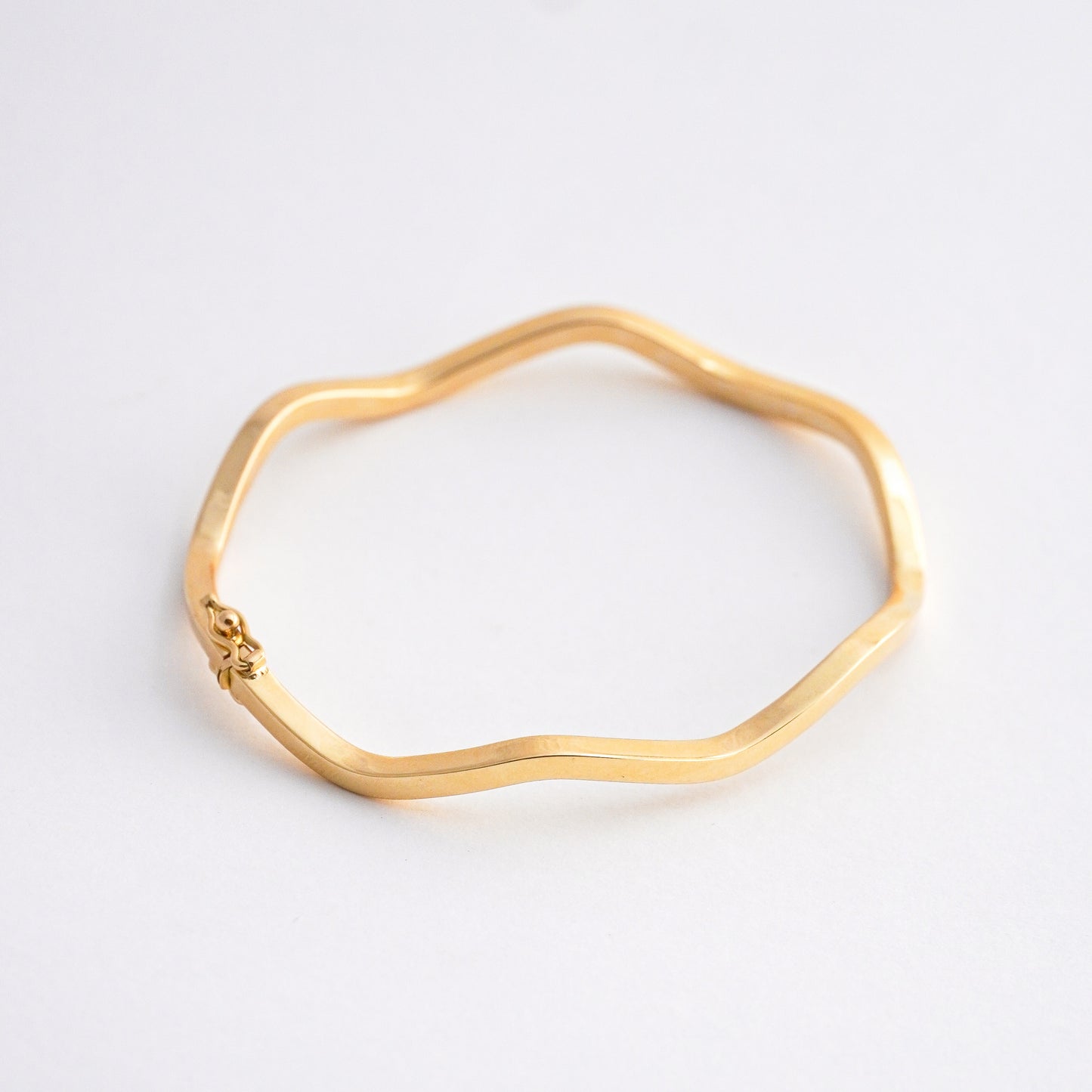 Puñera Wave  Oro 18K
