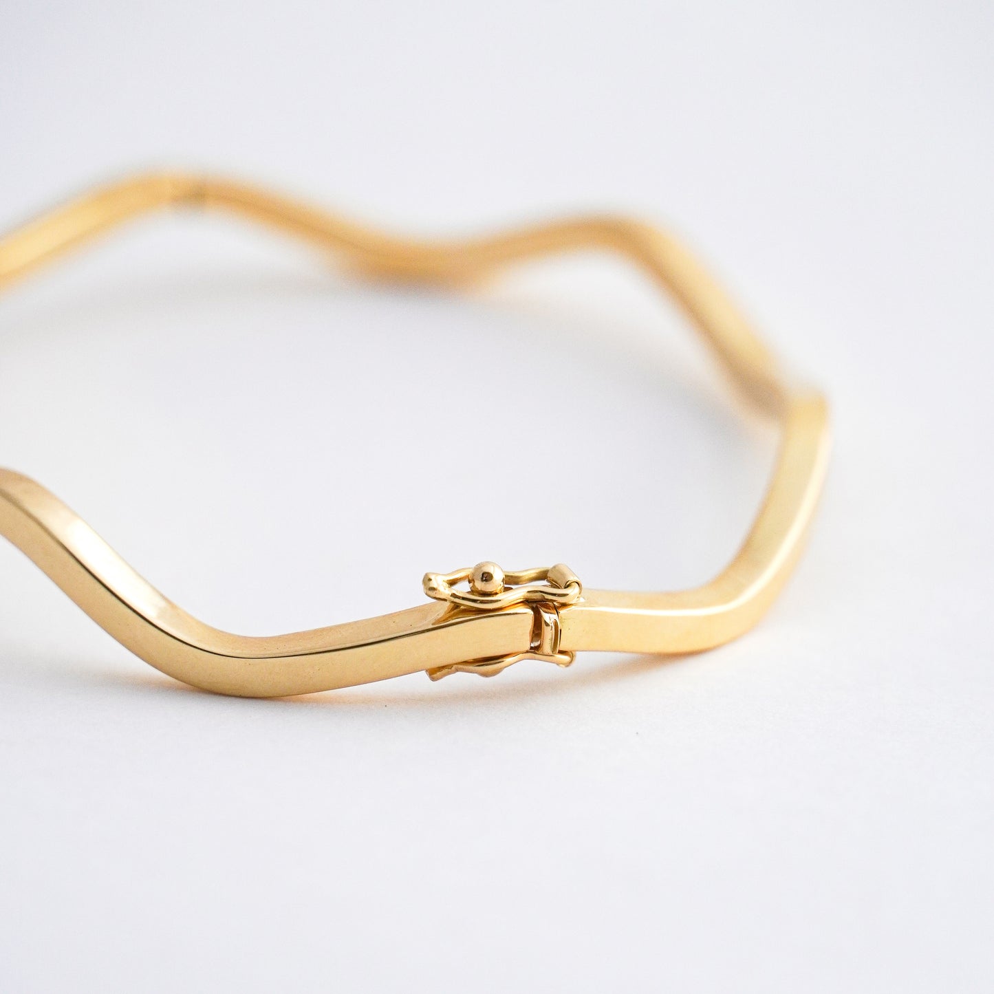 Puñera Wave  Oro 18K