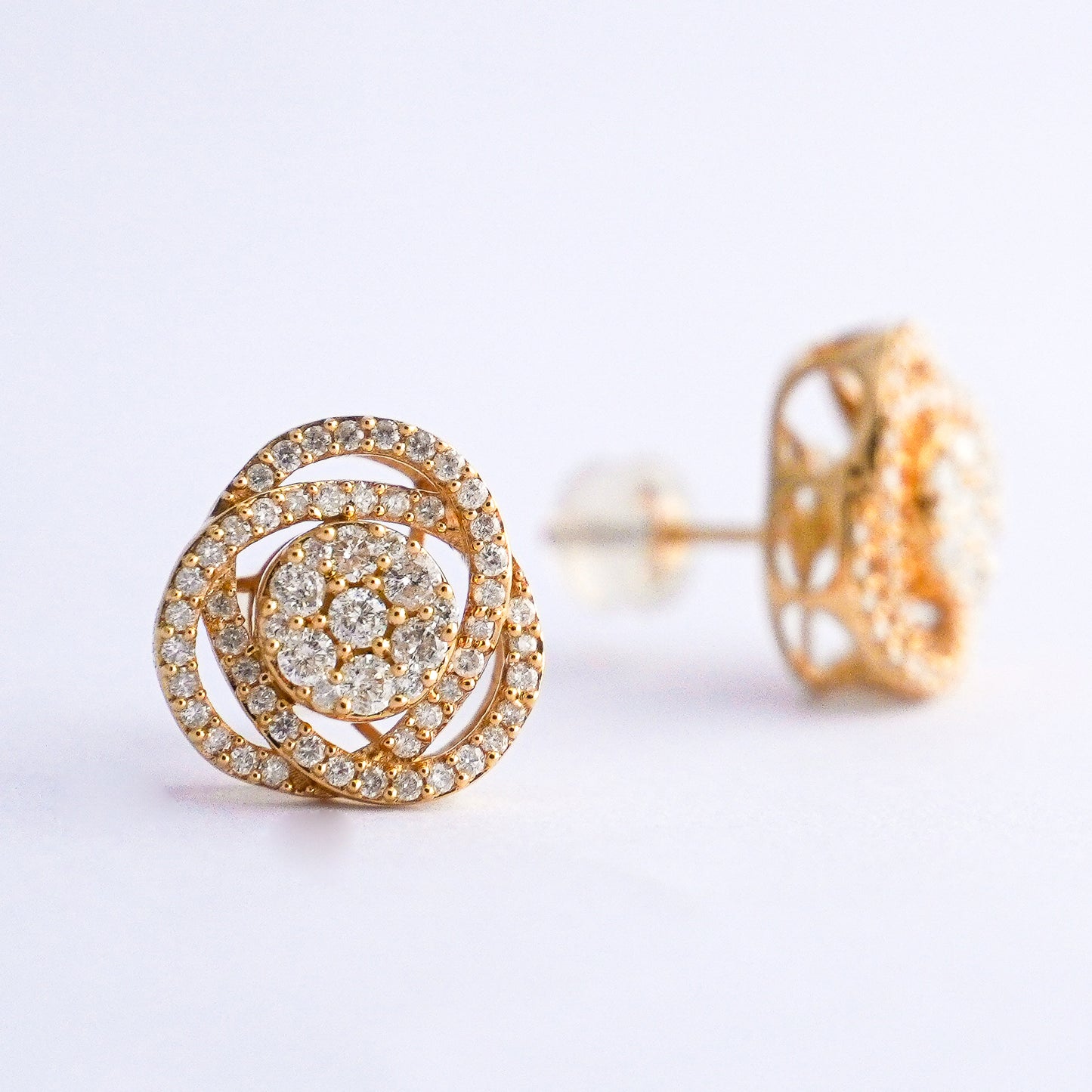 Aretes triara con diamantes naturales Oro18k