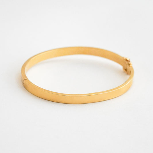 Puñera cinta gruesa 5mm  Oro18k