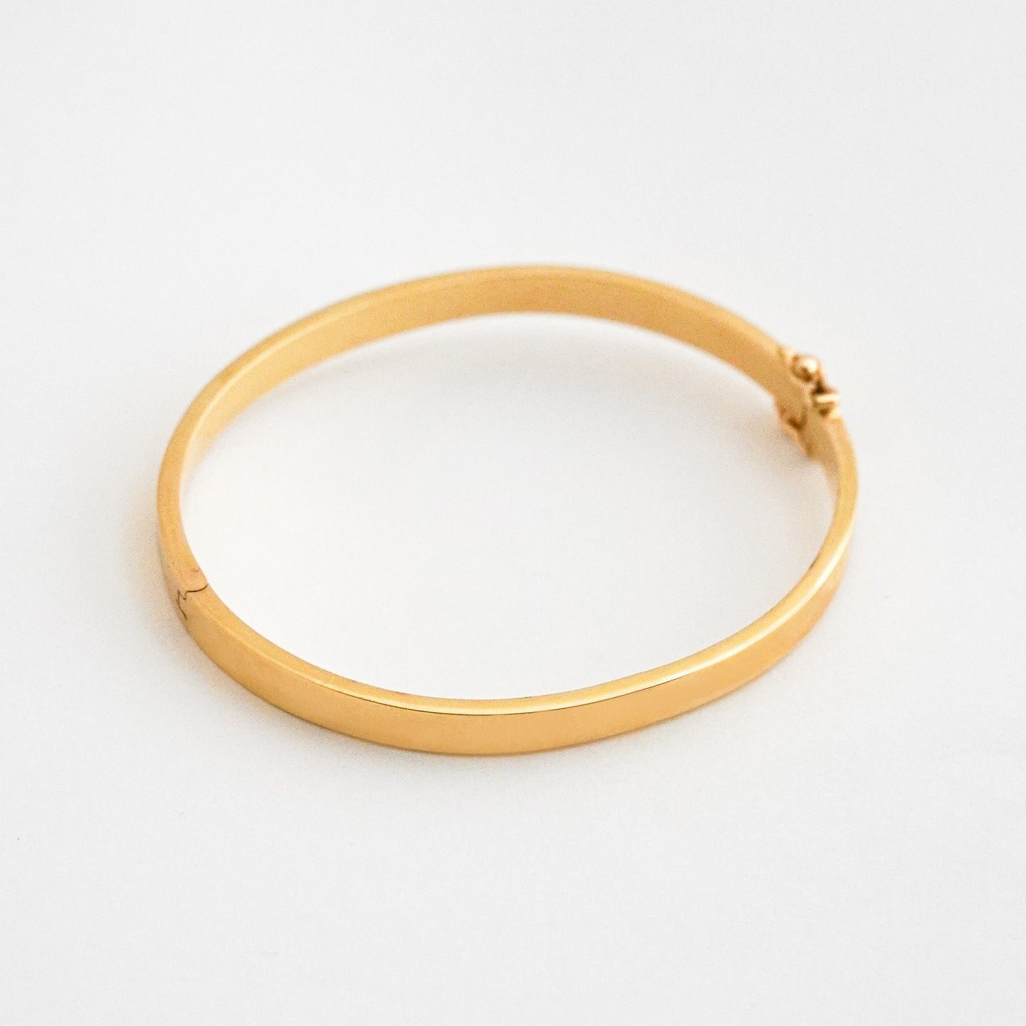 Puñera cinta gruesa 5mm  Oro18k