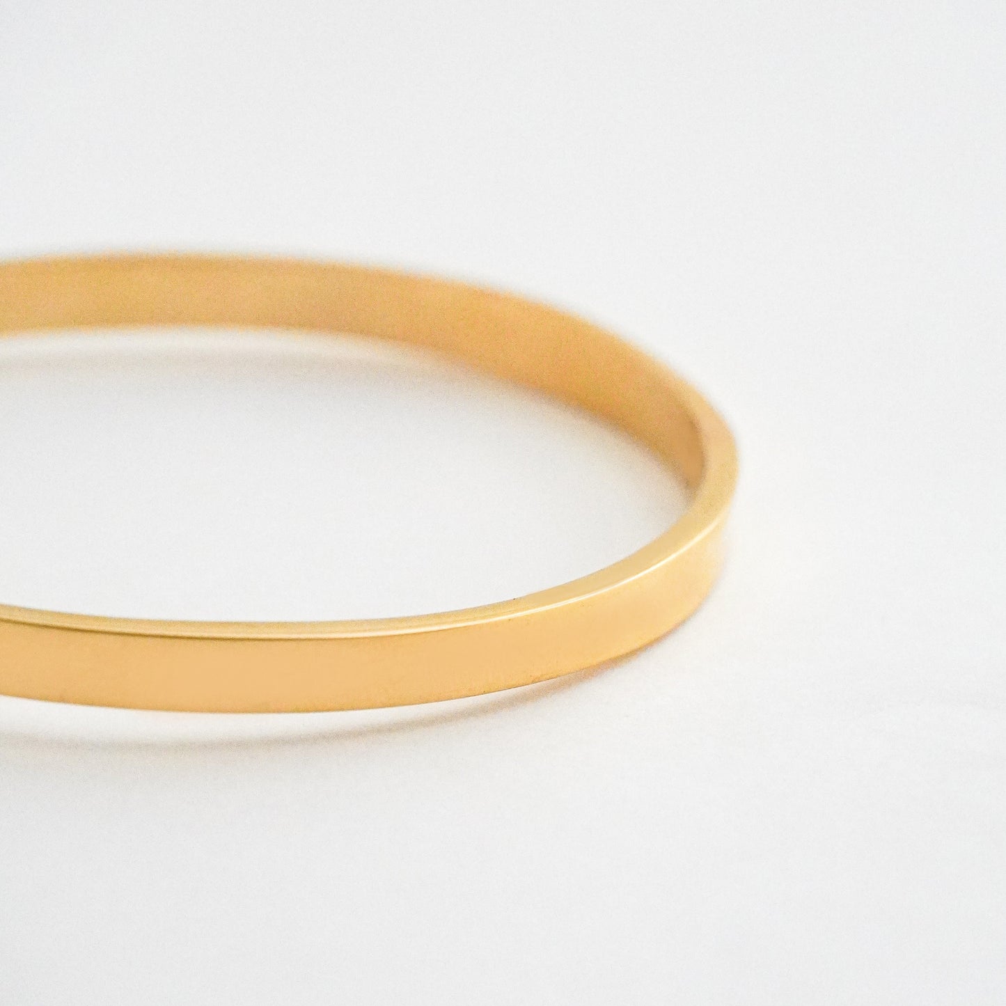 Puñera cinta gruesa 5mm  Oro18k