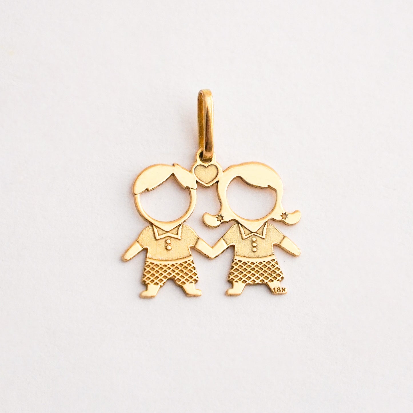 Dije de Niños Hermanos en Oro 18k