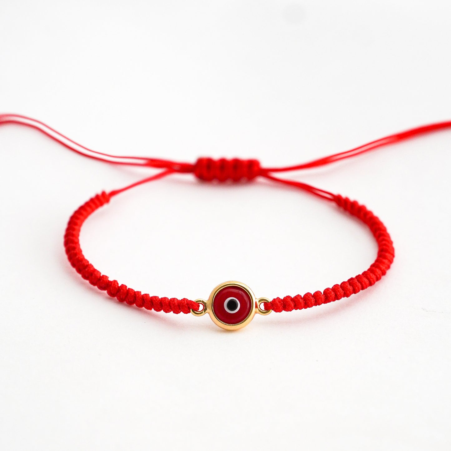 Pulsera tejida Ojo Turco Bicelado en Oro18k