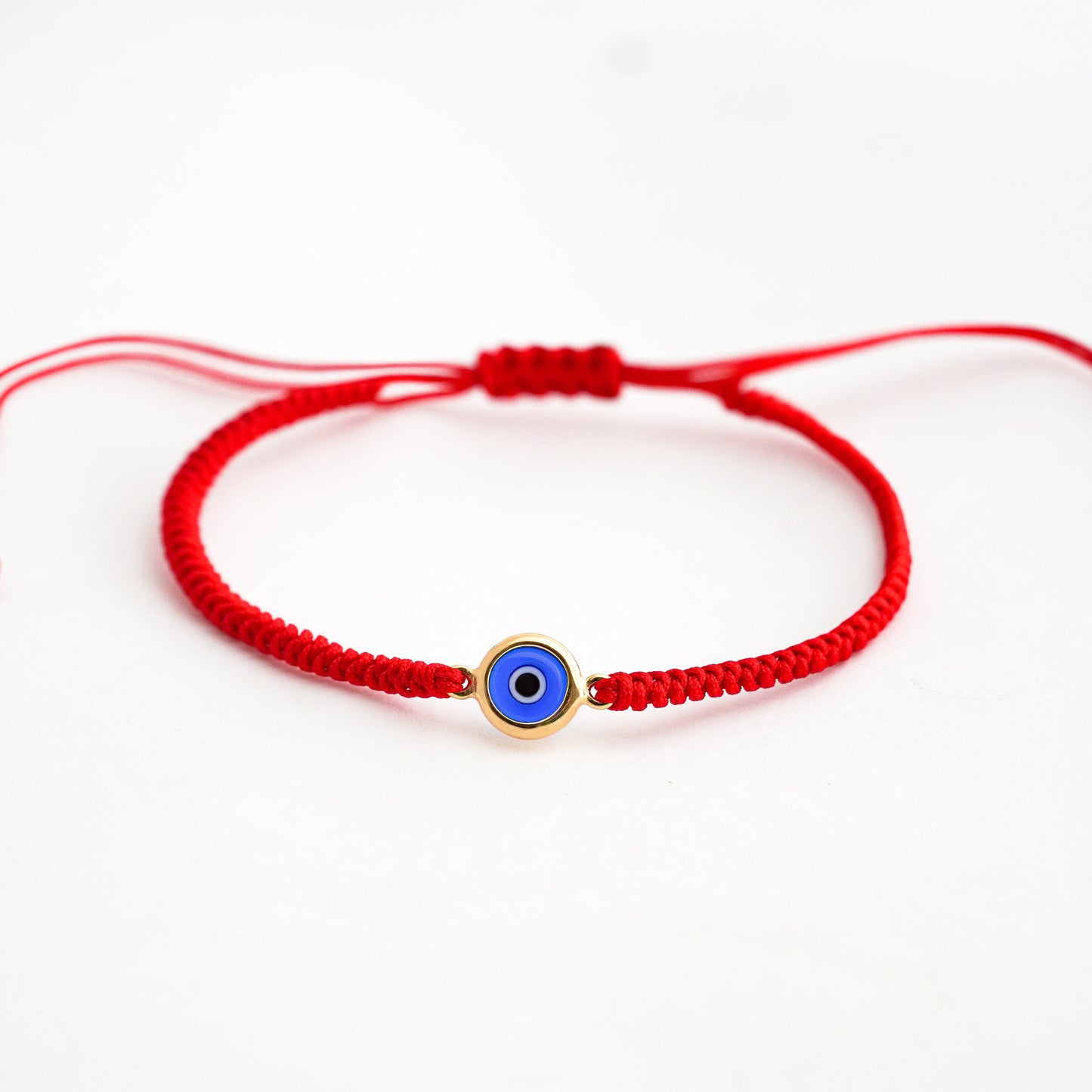 Pulsera tejida Ojo Turco Bicelado en Oro18k