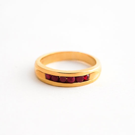 Anillo Banda Riviere Rubi en Oro 18K