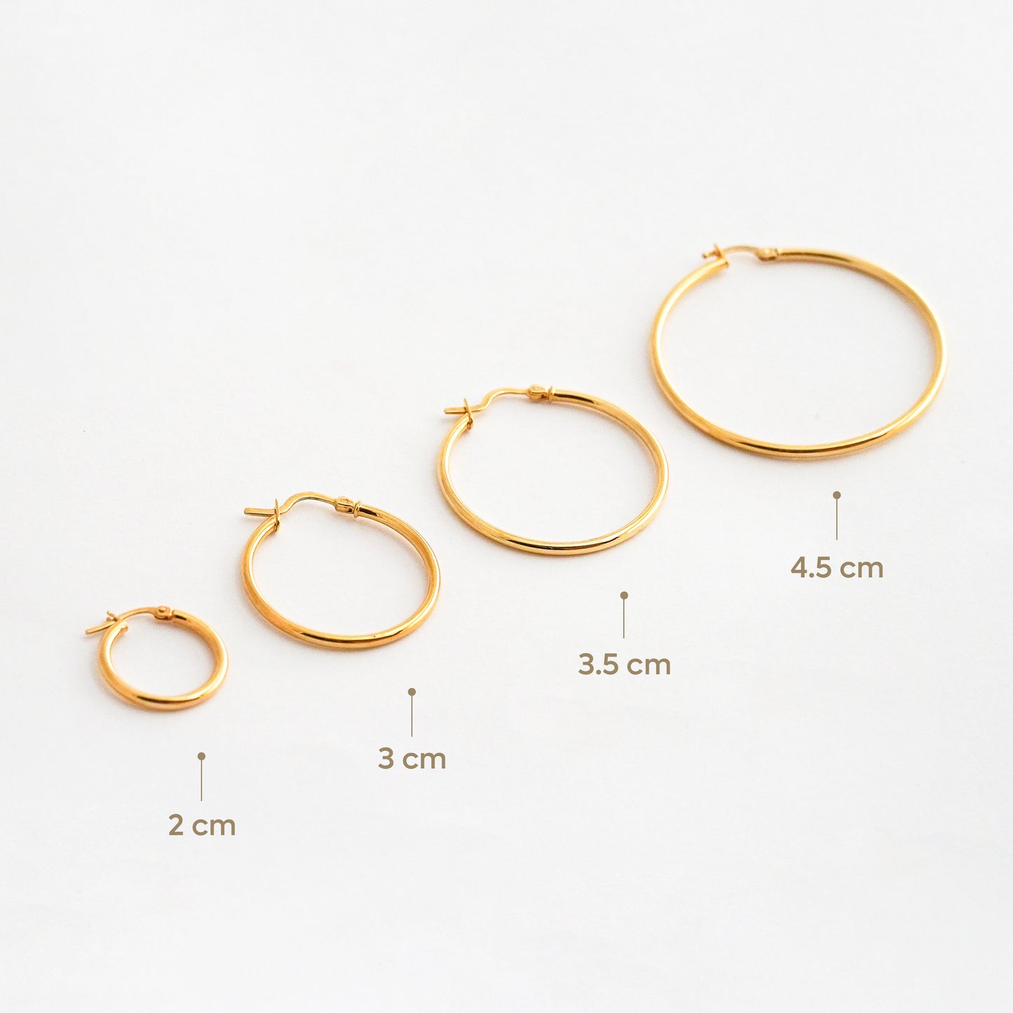 Argollas Tubo de 2 mm en Oro 18K