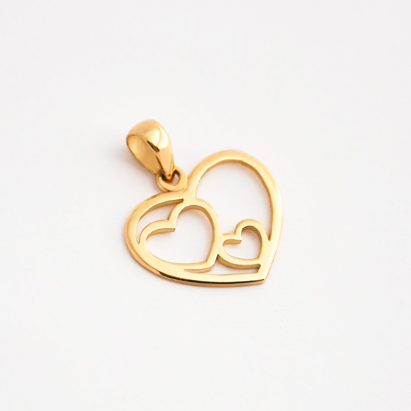 Dije Doble Corazón Oro 18K