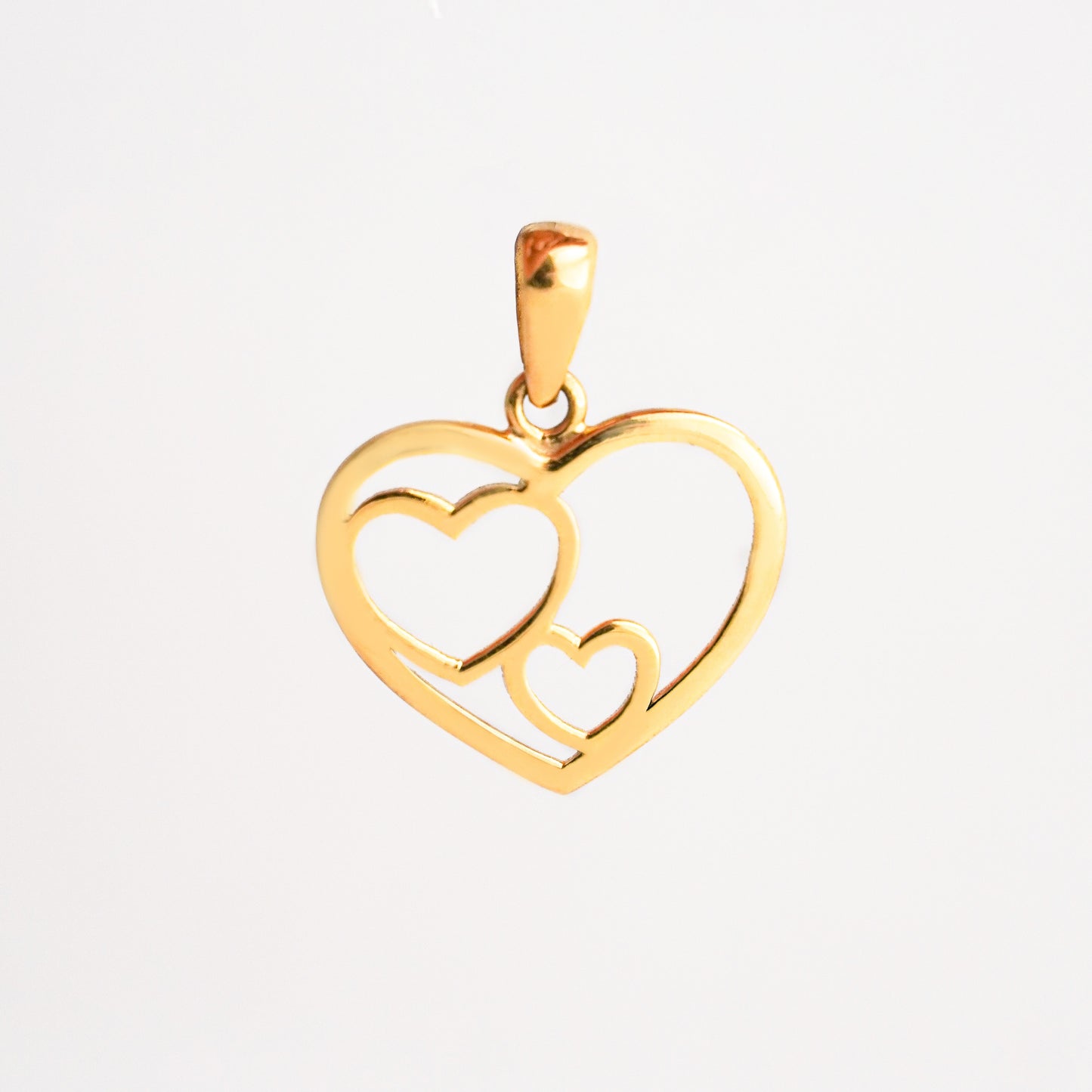 Dije Doble Corazón Oro 18K