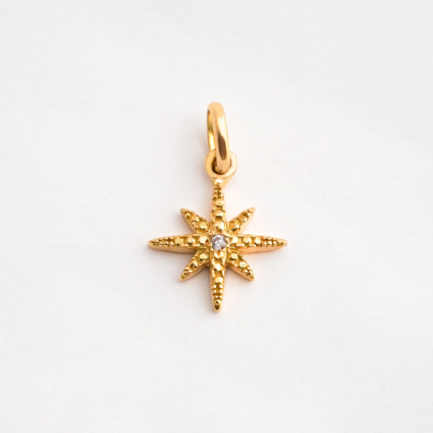 Dije Estrella Fugaz Oro 18K