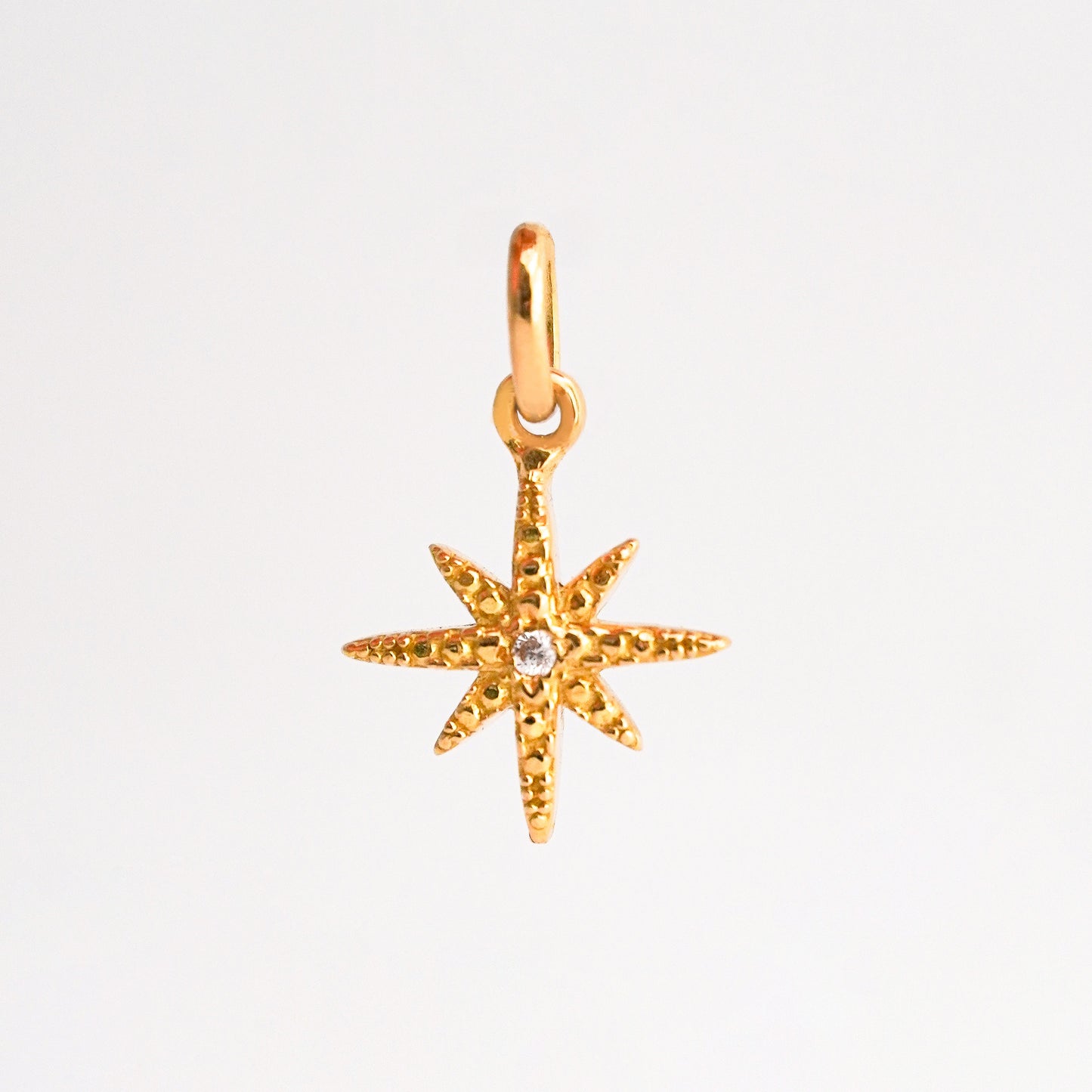 Dije Estrella Fugaz Oro 18K