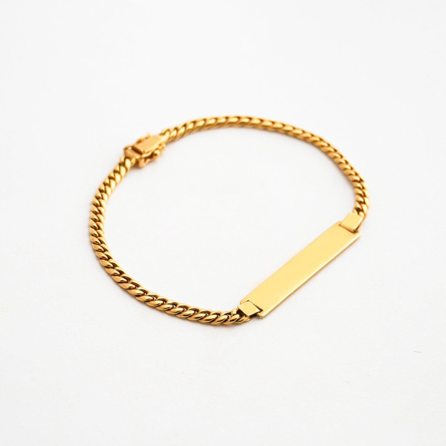 Pulsera barbada con placa para hombre en oro18k