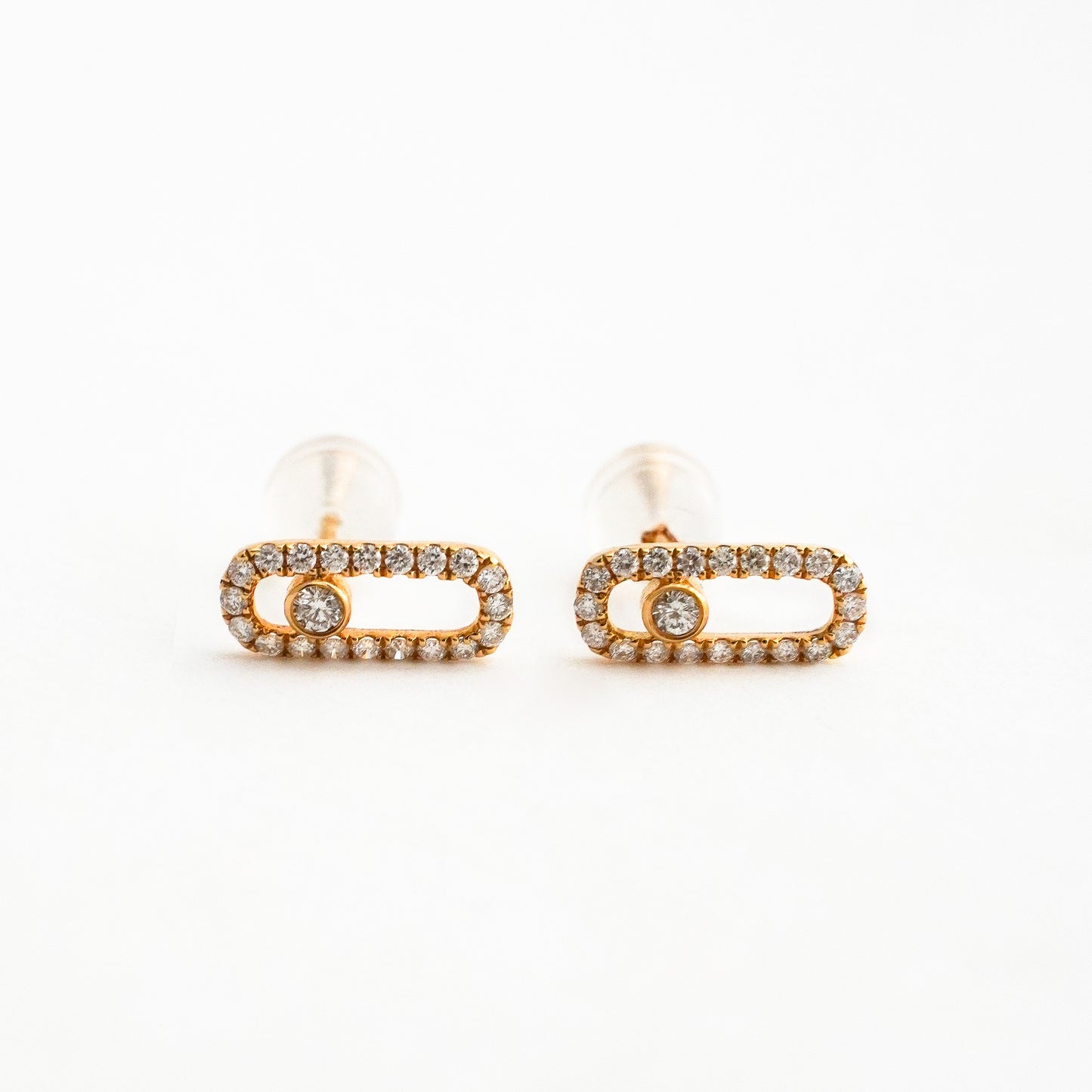 Aretes Motion Oval con Diamantes Naturales en Oro 18K