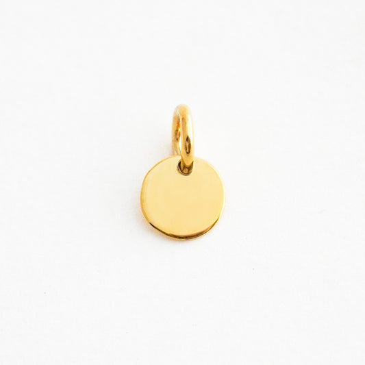 Dije Placa redonda Mini 7 mm  Oro 18K
