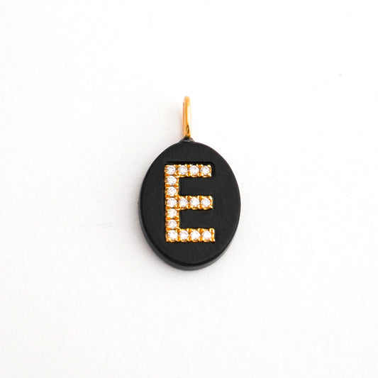 Dije de letra con diamantes naturales y ónix natural Oro18k
