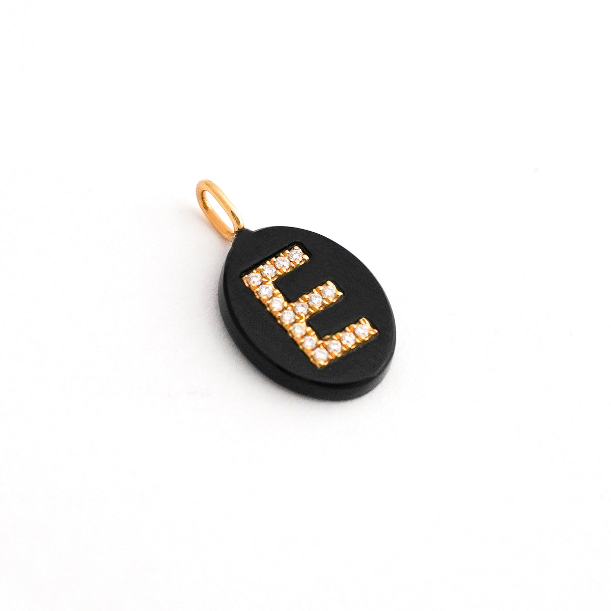 Dije de letra con diamantes naturales y ónix natural Oro18k