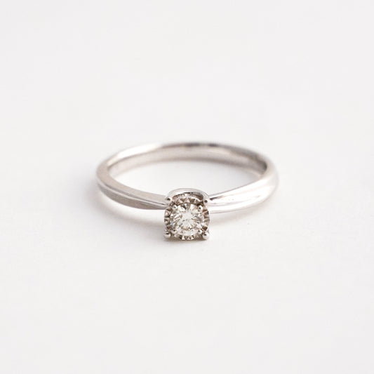 Anillo de compromiso 4 uñas con diamante 0.178 cts oro blanco 18k