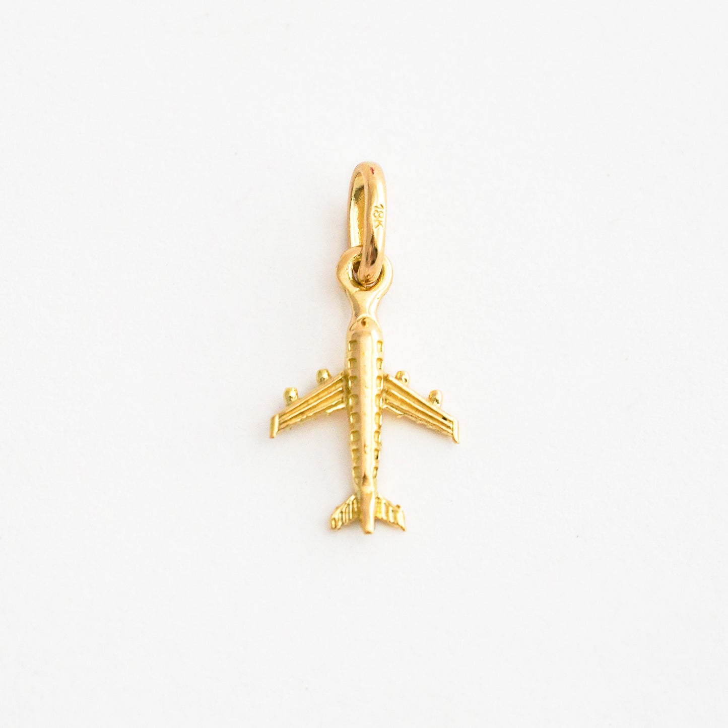 Dije Avión Pequeño en Oro 18K
