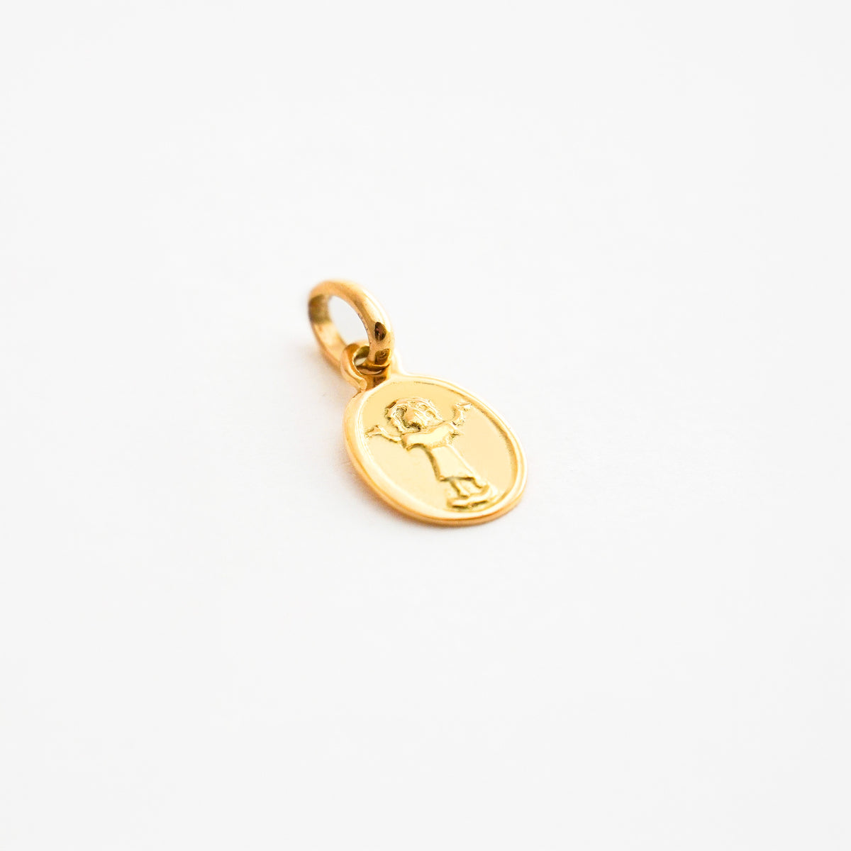 Medalla Divino Niño Pequeña en Oro 18K