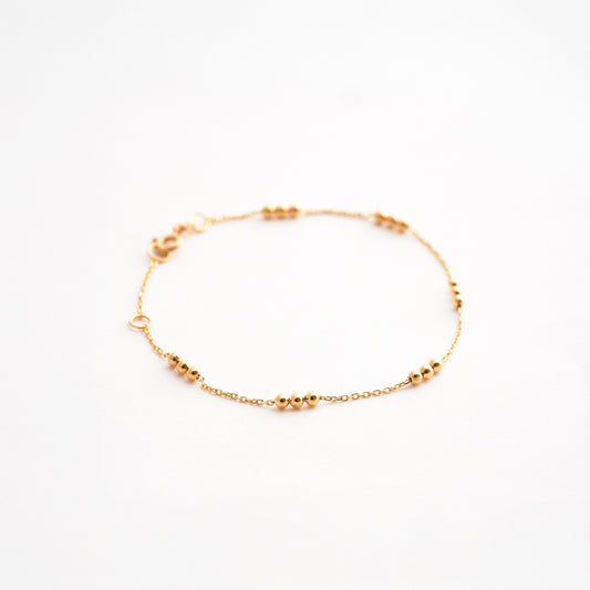 Pulsera Tres Bolitas en Oro 18K