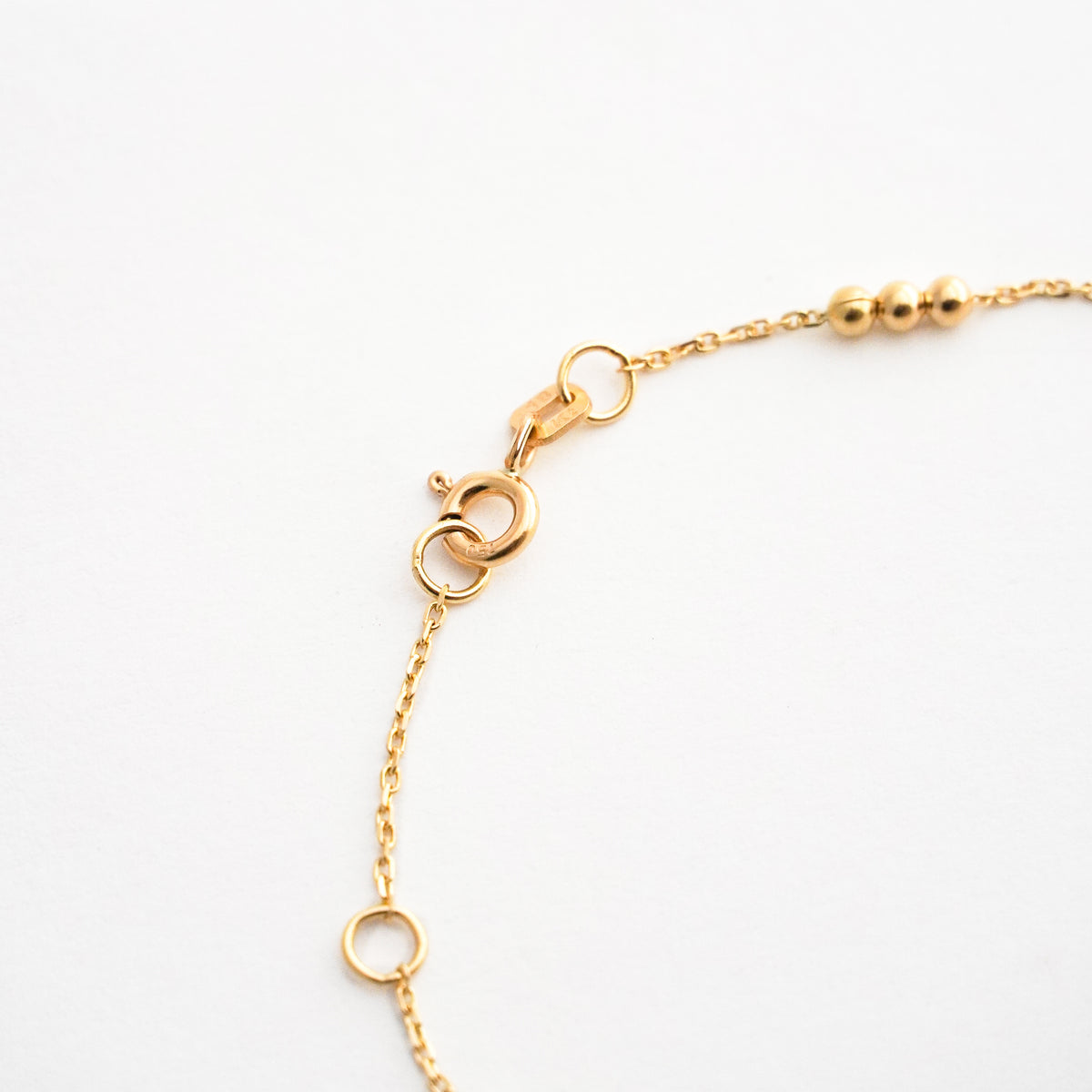 Pulsera Tres Bolitas en Oro 18K