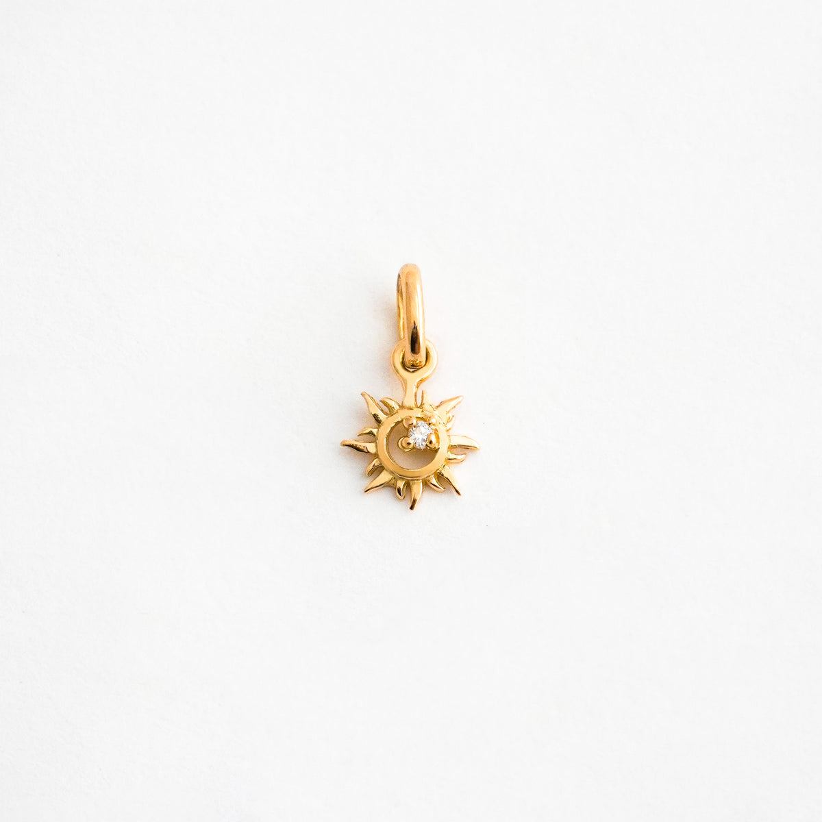 Dije Sol Natal en Oro 18K