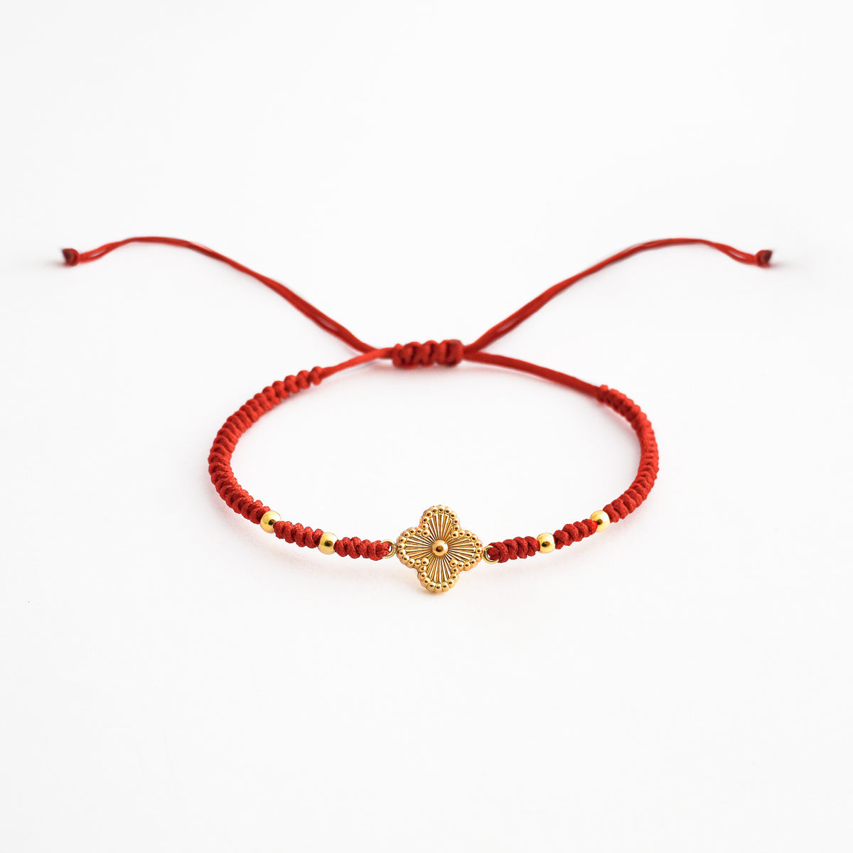 Pulsera Tejida Trébol Solitario con Bolitas en Oro 18K