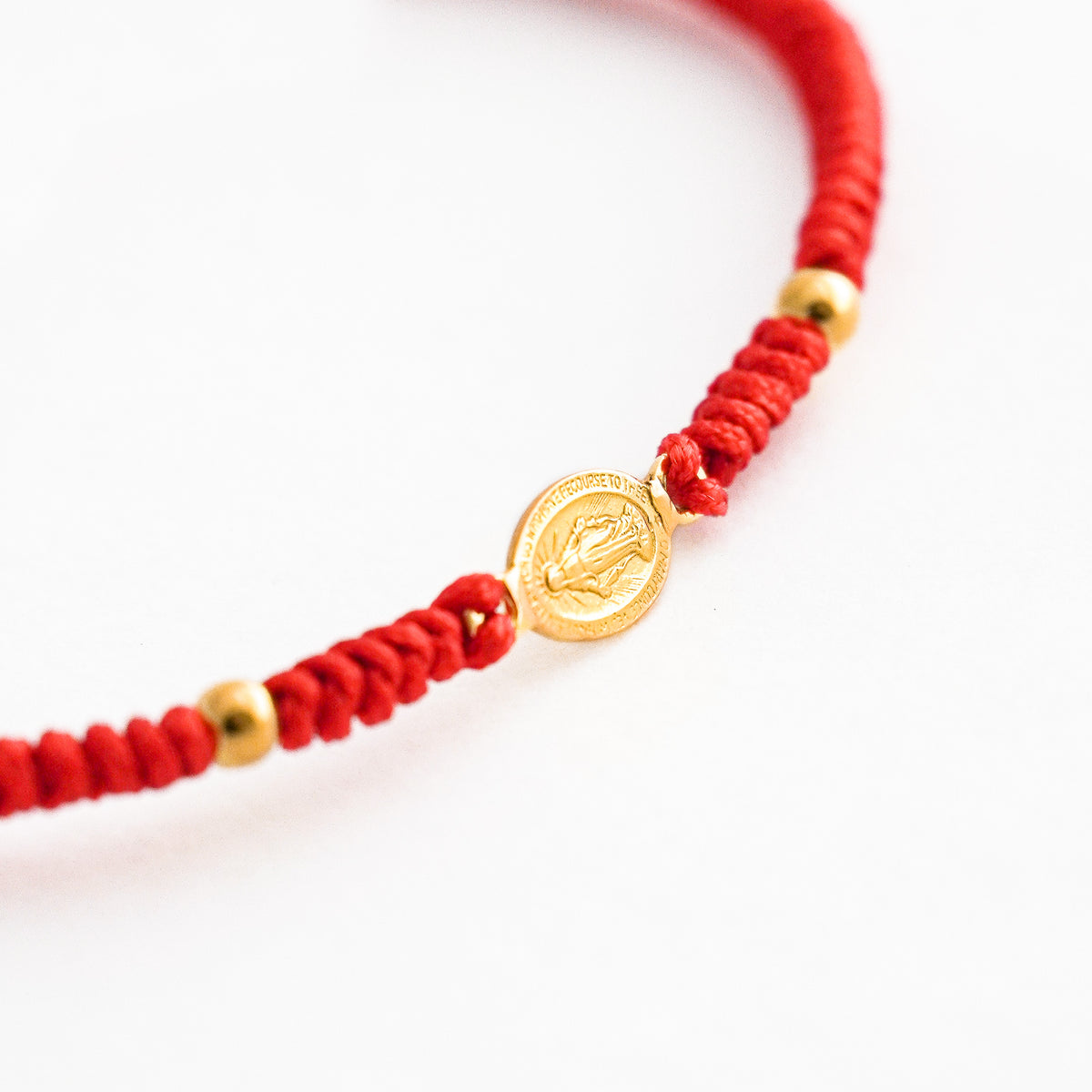 Pulsera Tejida con Medalla Virgen Milagrosa y Bolitas en Oro 18K