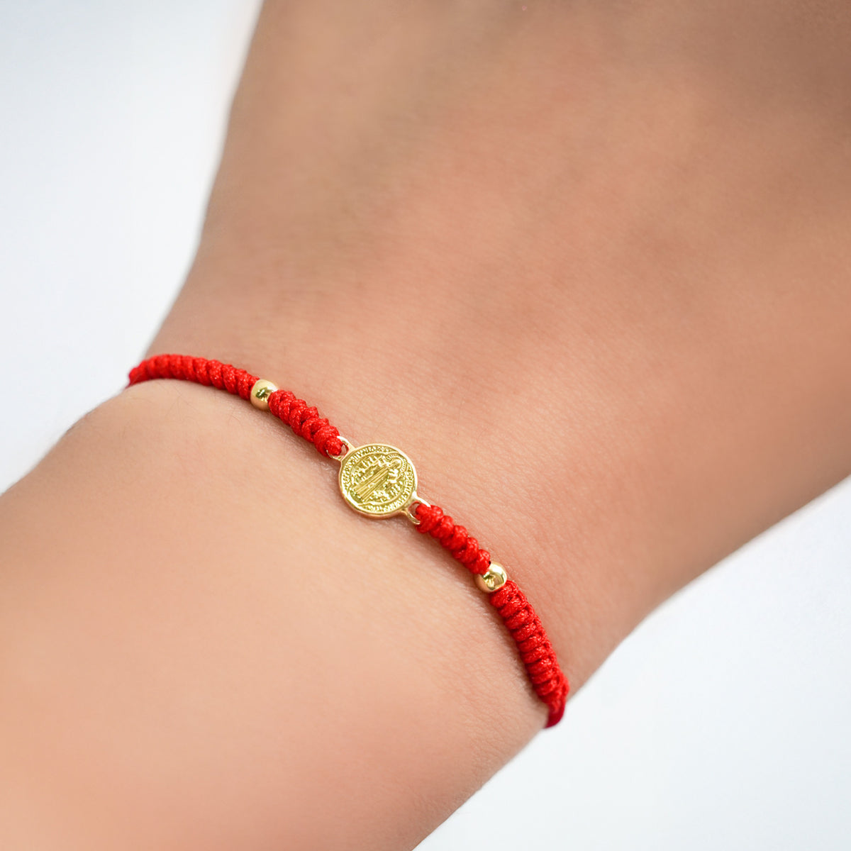 Pulsera Tejida San Benito con 2 bolitas en Oro 18k