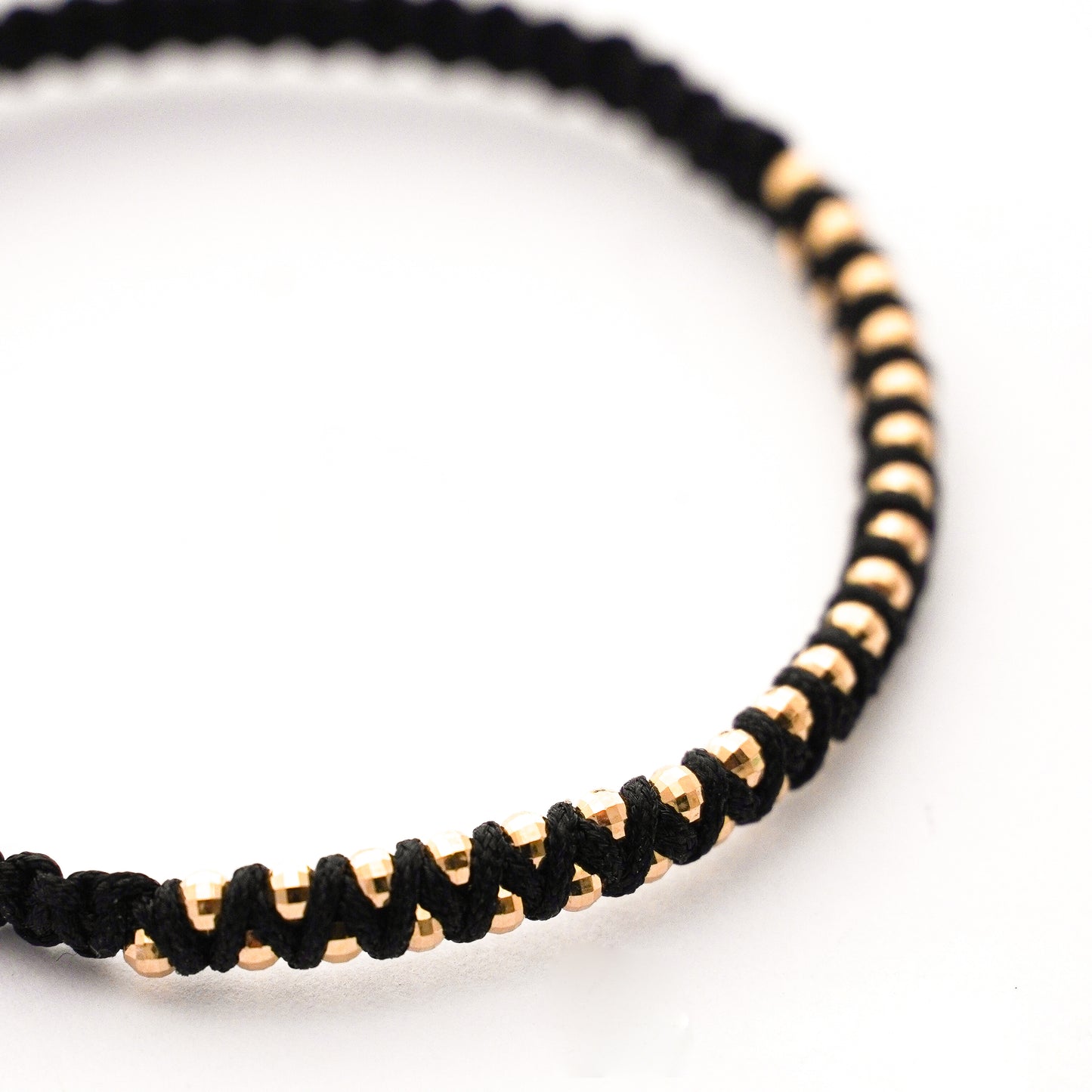 Pulsera tejida Spiral en Oro18k
