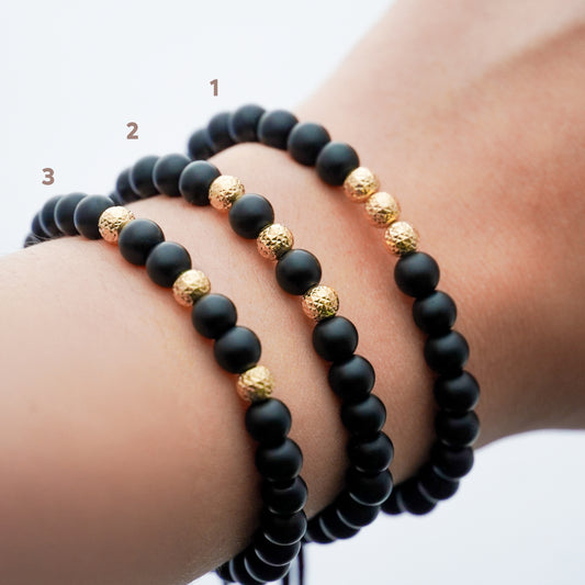 Pulsera tejida ónix con bolitas diamantadas 5mm en Oro18k