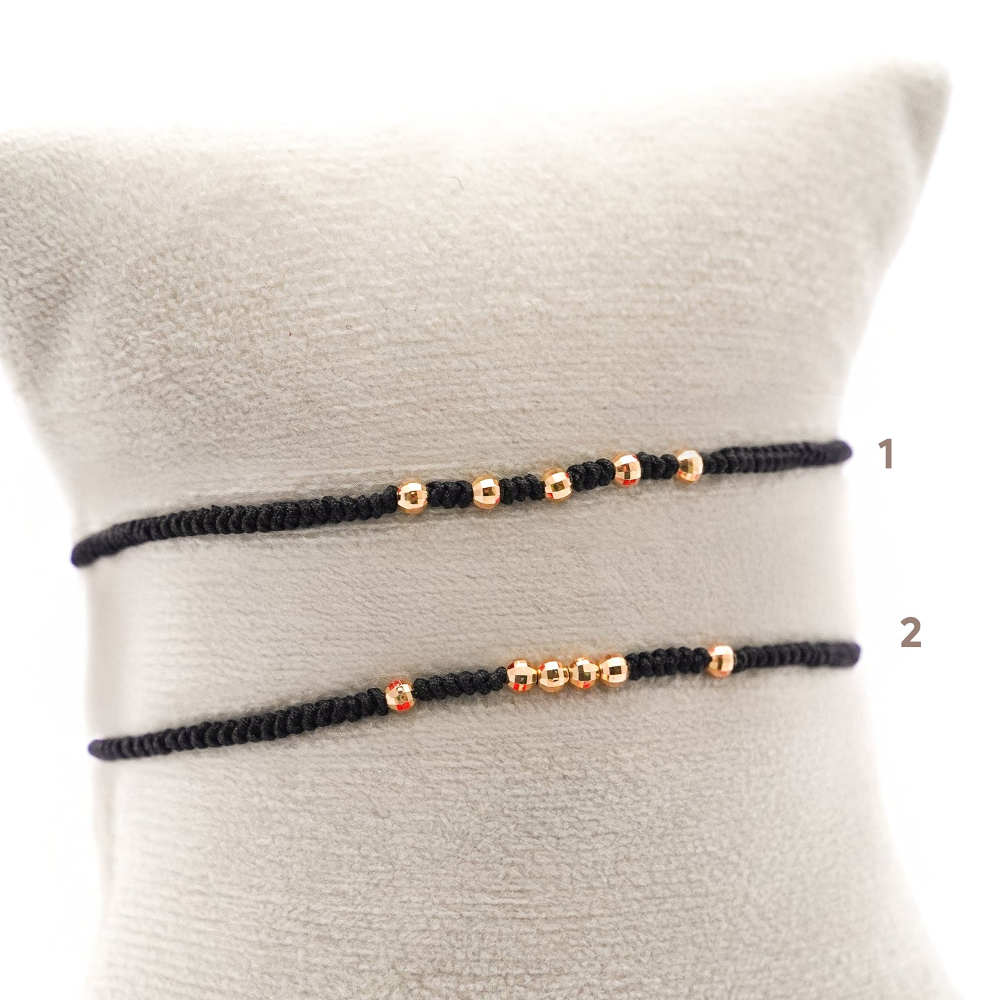 Pulsera tejida black line con bolitas diamantadas 2.5 mm en Oro18k