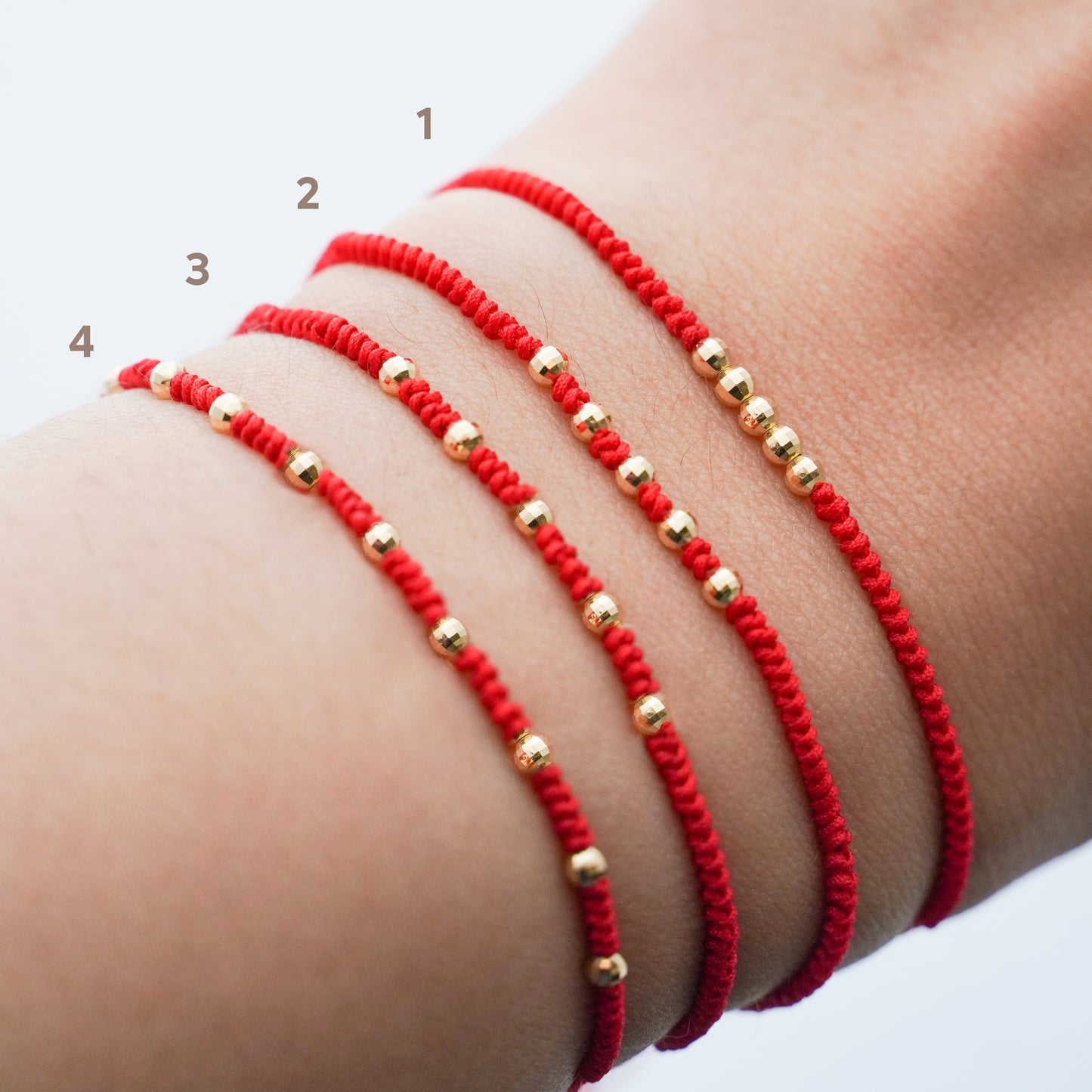 Pulsera tejida red line con bolitas diamantadas 2.5 mm en Oro18k